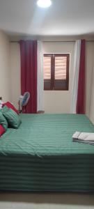 Letto o letti in una camera di guesthouse emaly