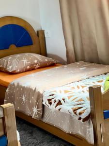 Postel nebo postele na pokoji v ubytování Cozy Rooms Korce
