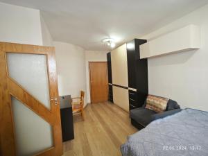 Ένα ή περισσότερα κρεβάτια σε δωμάτιο στο Apartment in the Center 1