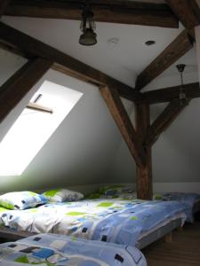 Postel nebo postele na pokoji v ubytování Torma Puhkemaja ja Glämping