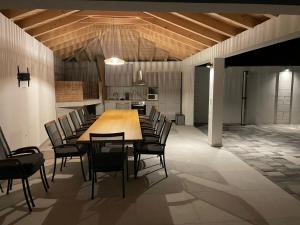 a large dining room with a long table and chairs at Villa Anna's heaven in Imotski