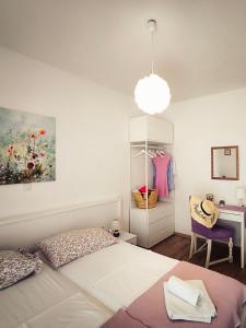 Postel nebo postele na pokoji v ubytování Apartments Prosperina Hvar + 24 fotografií
