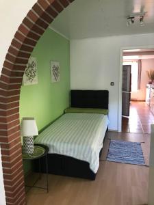 Postel nebo postele na pokoji v ubytování Golfhues-Simone-Ferienwohnung-EG