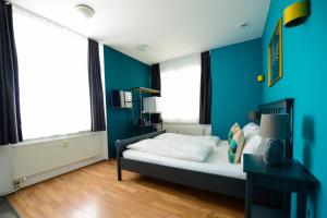 Rúm í herbergi á Berger Zentrum