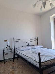 Ένα ή περισσότερα κρεβάτια σε δωμάτιο στο La casa in collina