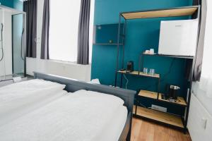 Rúm í herbergi á Berger Zentrum