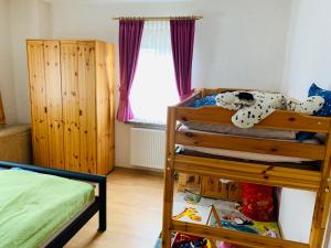 Postel nebo postele na pokoji v ubytování Ferienwohnung Juttchen