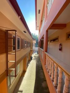 an empty corridor of a school building at Prime Lodge Hotel in Romblon +12 photos