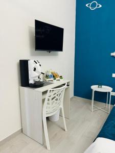 TV a/nebo společenská místnost v ubytování Sirio rooms and apartments + 37 fotografií