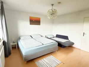 Postel nebo postele na pokoji v ubytování Panorama-Haus Wohnung Säntis