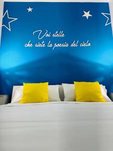 Postel nebo postele na pokoji v ubytování Sirio rooms and apartments