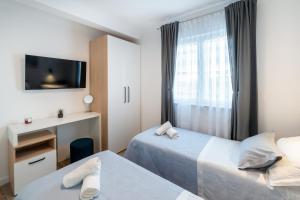 Postel nebo postele na pokoji v ubytování Apartman Sea Heaven, Kanica