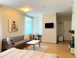 TV a/nebo společenská místnost v ubytování Tulbi Guesthouse