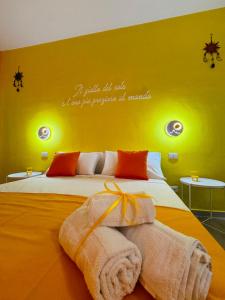 Postel nebo postele na pokoji v ubytování Sirio rooms and apartments