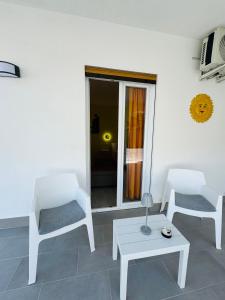 TV a/nebo společenská místnost v ubytování Sirio rooms and apartments