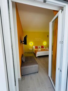 Postel nebo postele na pokoji v ubytování Sirio rooms and apartments