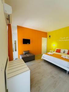 Postel nebo postele na pokoji v ubytování Sirio rooms and apartments