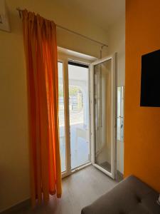 TV a/nebo společenská místnost v ubytování Sirio rooms and apartments