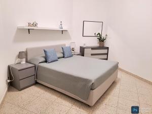 Postel nebo postele na pokoji v ubytování EmyFrancesco house
