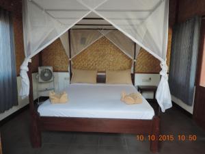 Ένα ή περισσότερα κρεβάτια σε δωμάτιο στο Yaya Bungalows Blue Coral +49 φωτογραφίες