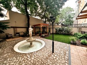 Vonkajšia záhrada v ubytovaní Alfons Boutique Hotel