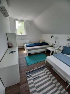 En eller flere senge i et værelse på Zita görög stílusú háza