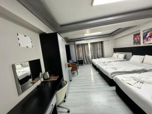 Postel nebo postele na pokoji v ubytování Retrol Hotel
