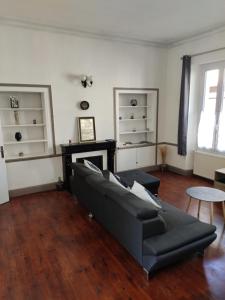 Posezení v ubytování Au Logis Du Summer