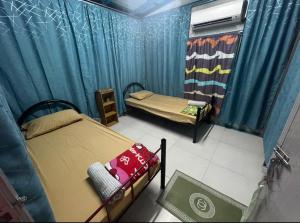 Memory Lane Tioman客房内的一张或多张床位