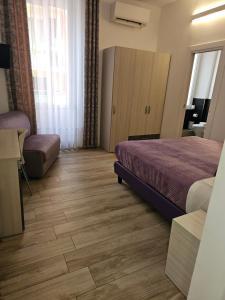 Postel nebo postele na pokoji v ubytování Affittacamere 5 Terre Dolci Sogni