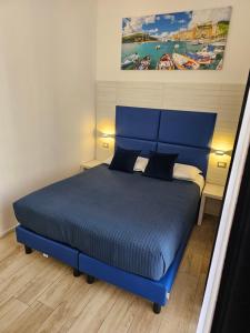 Postel nebo postele na pokoji v ubytování Affittacamere 5 Terre Dolci Sogni