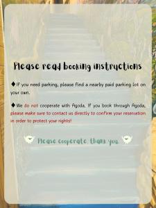 a sign that reads massage recallboarding instructions at One House in Gongliao