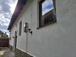 a window on the side of a building at Clar studio 1 in Braşov