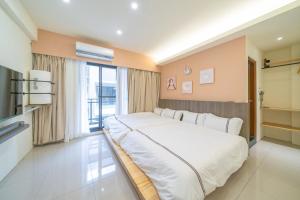 Postel nebo postele na pokoji v ubytování Mu Xia Homestay + 12 fotografií