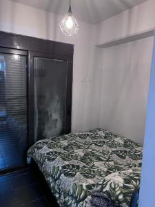 Llit o llits en una habitació de PDC Rhodes