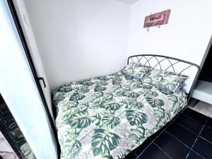 Llit o llits en una habitació de PDC Rhodes