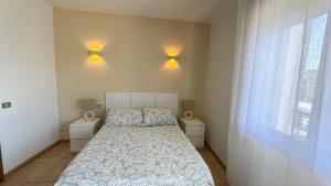 Postel nebo postele na pokoji v ubytování Apartamento LB, vistas a la ría