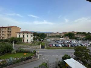 a view of a parking lot with cars parked at La Casa di Alex - Alex's House in Colle Val D'Elsa
