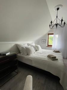 Säng eller sängar i ett rum på DOM DENARI