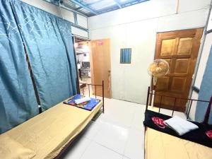Memory Lane Tioman客房内的一张或多张床位