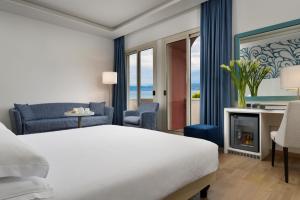 Łóżko lub łóżka w pokoju w obiekcie Hotel Continental Wellness & Spa