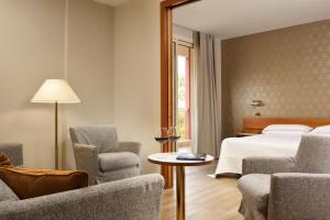 Łóżko lub łóżka w pokoju w obiekcie Hotel Continental Wellness & Spa
