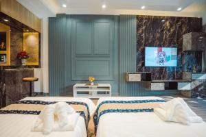 Giường trong phòng chung tại 泰国芭提雅TUYLY Hill +36 ảnh