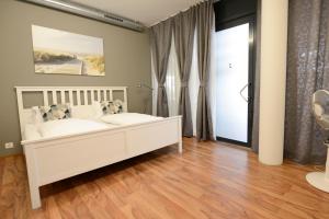 Rúm í herbergi á Berger Zentrum
