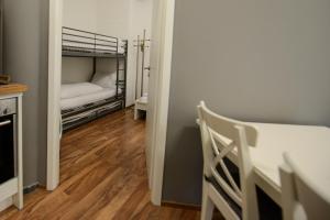 Rúm í herbergi á Berger Zentrum