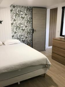 VUE LAC LODGES客房内的一张或多张床位
