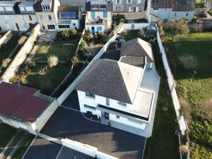 an overhead view of a house with a roof at Sallenelles Face à la baie in Sallenelles