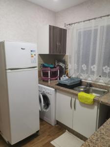 Kuchyň nebo kuchyňský kout v ubytování luxe appartement saidia