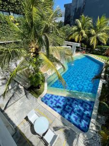 Bazén v ubytování Venus Private Pool Kuta By iLys Collection nebo v jeho okolí