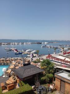 a view of a marina with boats in the water at Fantastic Apartment in Sveti Vlas in Sveti Vlas